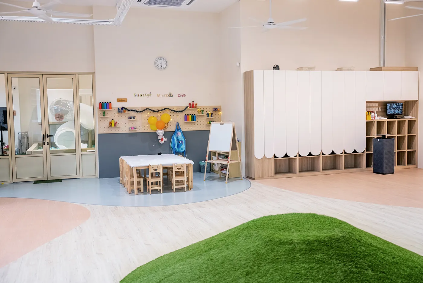 Classroom with drawing area and grass mound